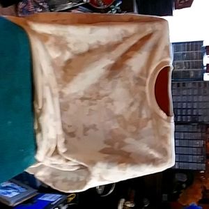 An off white with some  leaves and songbird (the f